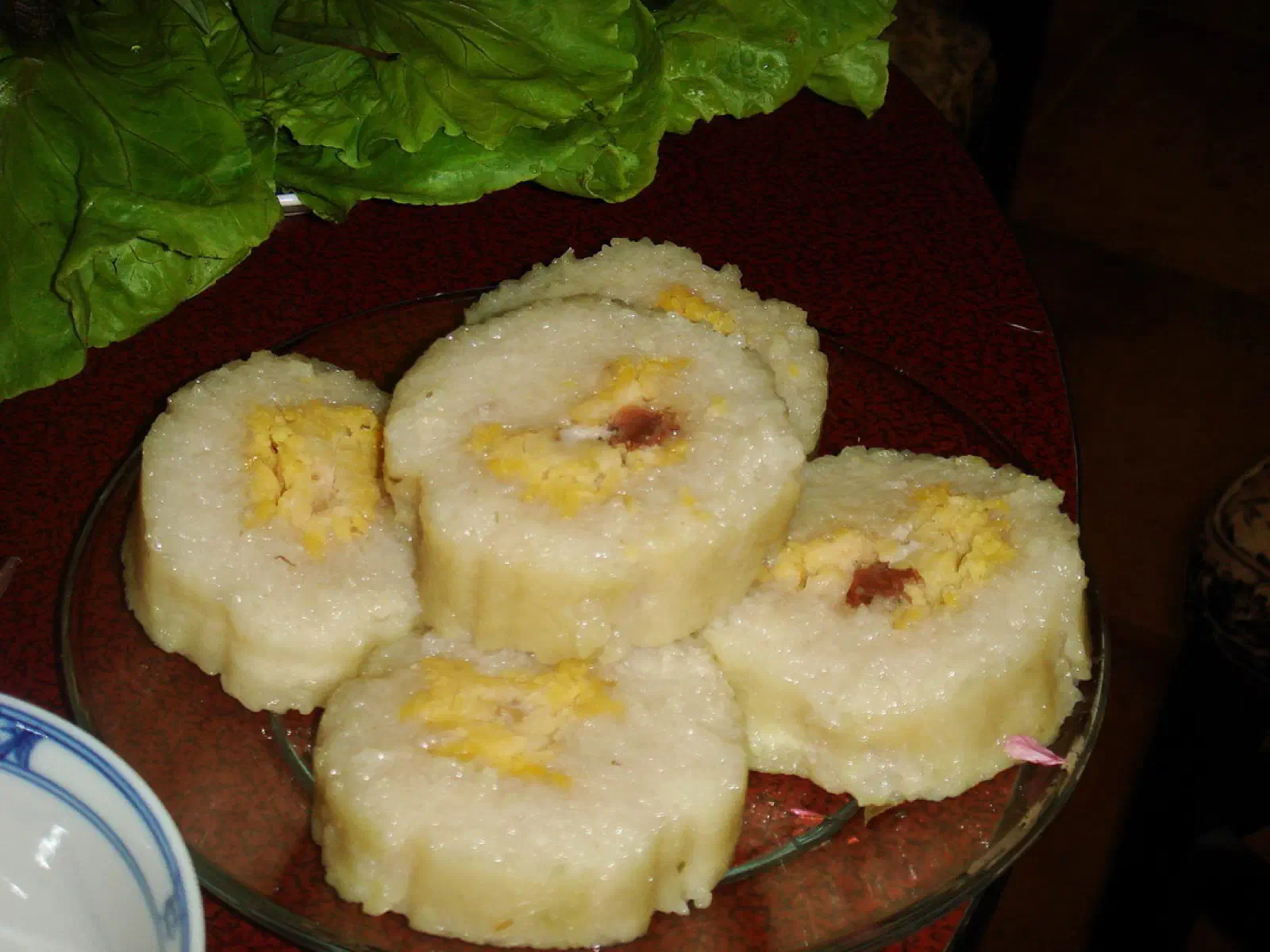 Tìm hiểu bánh tét: nguồn gốc và lịch sử, truyền thuyết vua Quang Trung, ý nghĩa Tết của đòn bánh Nam Bộ và cách thưởng thức đúng điệu.